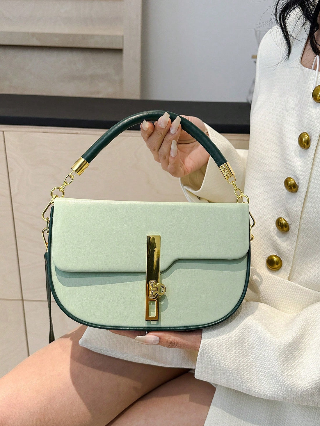 Upgrade your work attire with the Chic Color Block Commuter Satchel. Its stylish design and easy-to-use flap closure make it perfect for the modern professional. Stay organized and look fashionable with this must-have work bag.