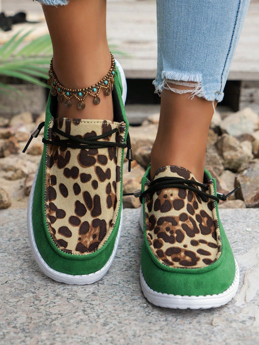 Experience both comfort and style with our Green Leopard Print Slip-On Canvas Shoes. Slip them on effortlessly and make a fashion statement with the trendy leopard print design. Designed for casual wear, these shoes provide a comfortable fit and are perfect for any occasion. Elevate your shoe game today!