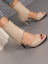 Sleek and Stylish: Black Peep Toe Stiletto Sandal Boots