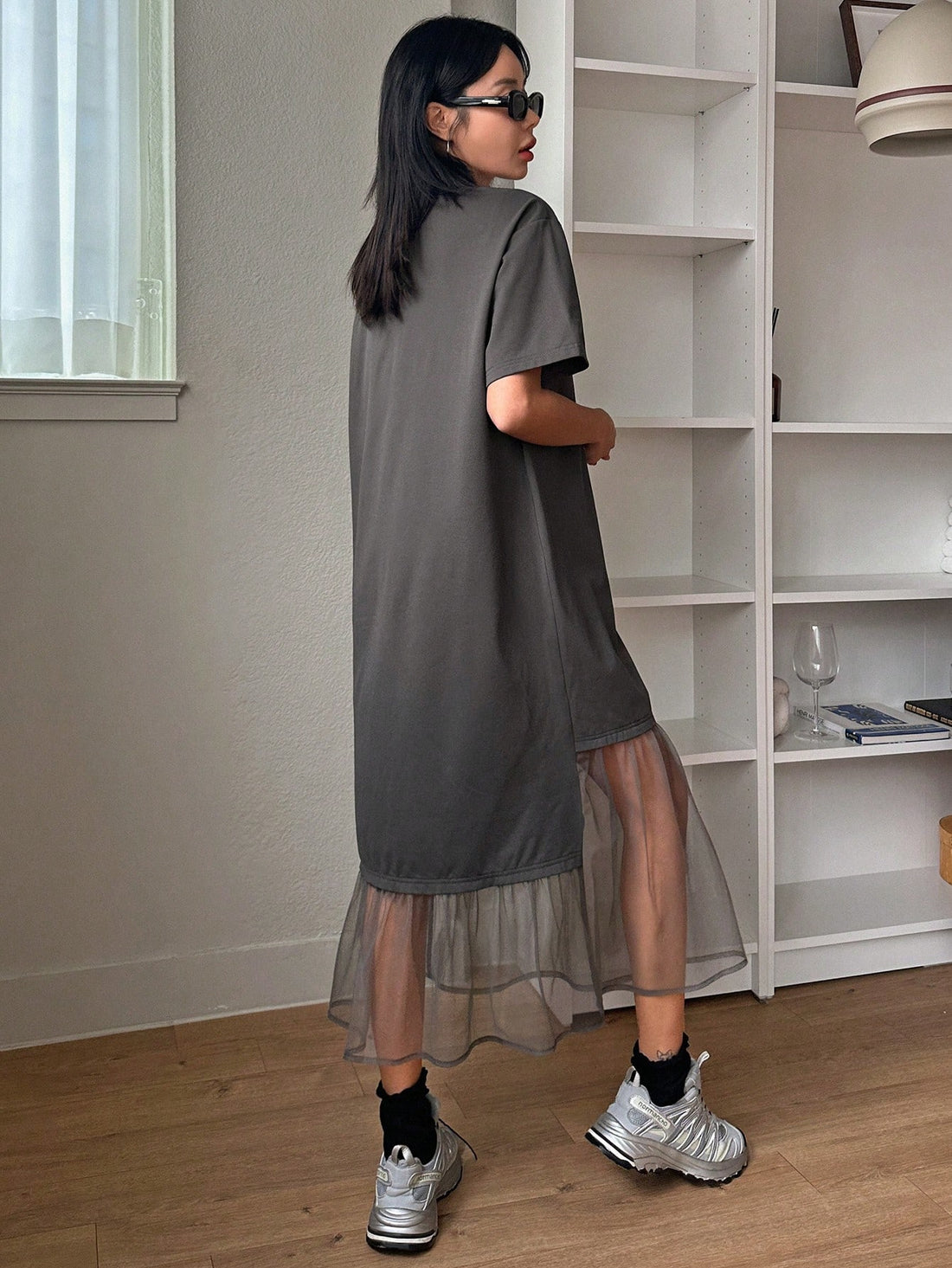 Elevate your wardrobe with the Mesh Spliced T-Shirt Dress: Effortless Style for Women. Made with breathable mesh fabric and a flattering t-shirt silhouette, this dress offers both style and comfort. Perfect for any occasion, it's a must-have for every fashion-forward woman.