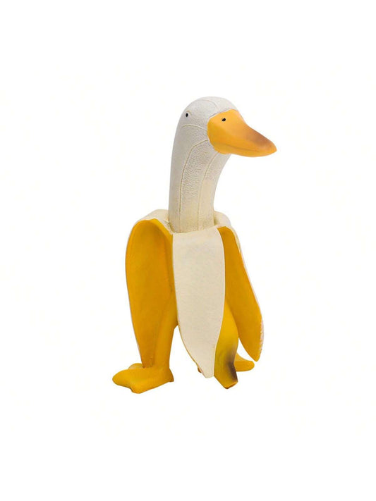 Transform your garden into a whimsical wonderland with our Quirky Banana Duck Garden Statue. Crafted from durable materials, this delightful piece adds a touch of charm to both indoor and outdoor spaces. Its unique design is sure to make a statement and bring joy to all who see it.