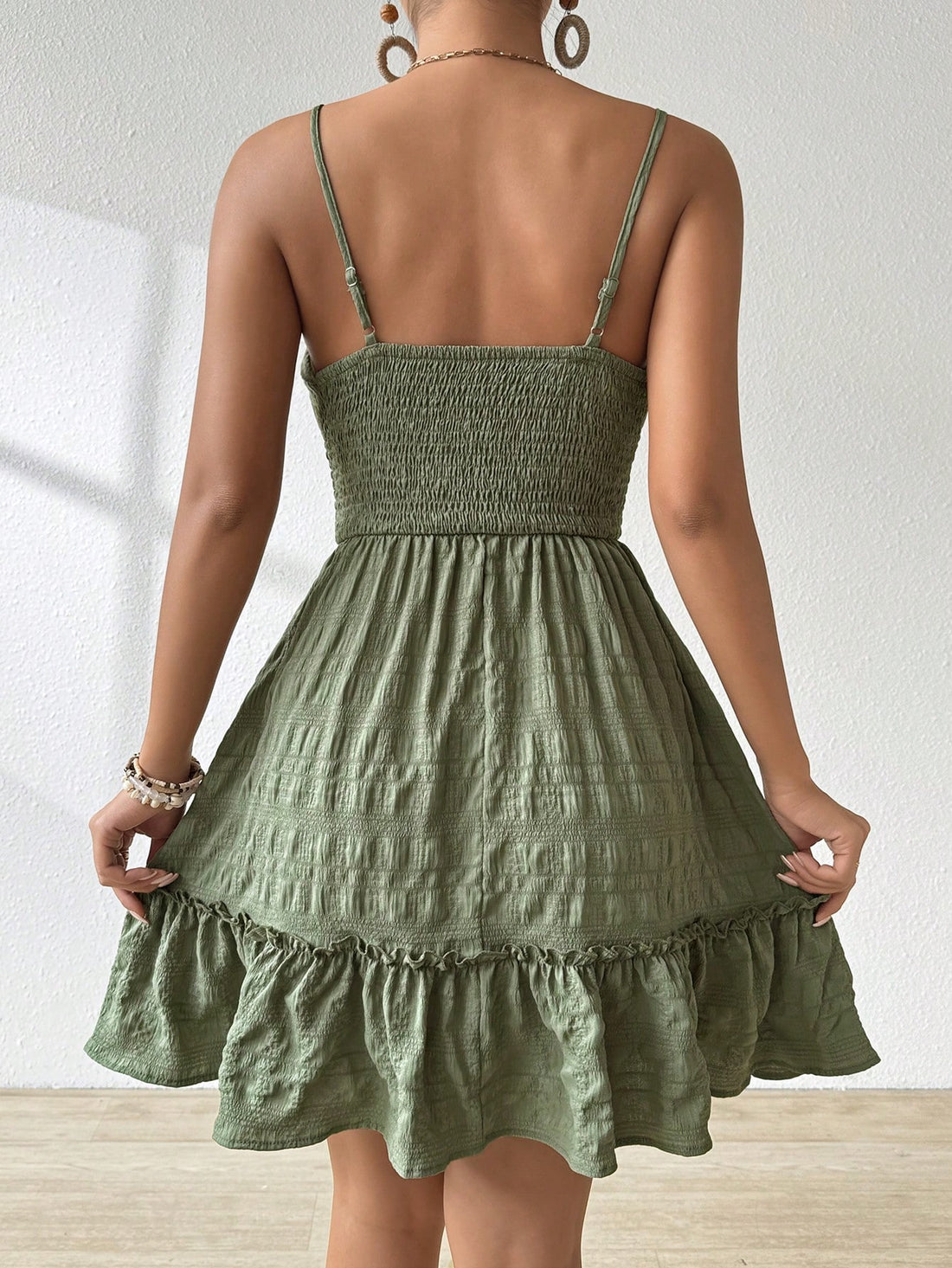 Look effortlessly stylish in our Chic and Comfy Strap Dress! With a textured shirred waist and trendy solid color, this dress offers both comfort and style. Perfect for any occasion, you'll be turning heads with ease. (No more fashion struggles for you!)