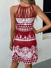 Bold and Beautiful: Black and White Printed Sleeveless Summer Dress with Netted and Spliced Design