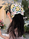 Bohemian Blossom: Knitted Hollow Flower Hairband with Tie-Dye Print