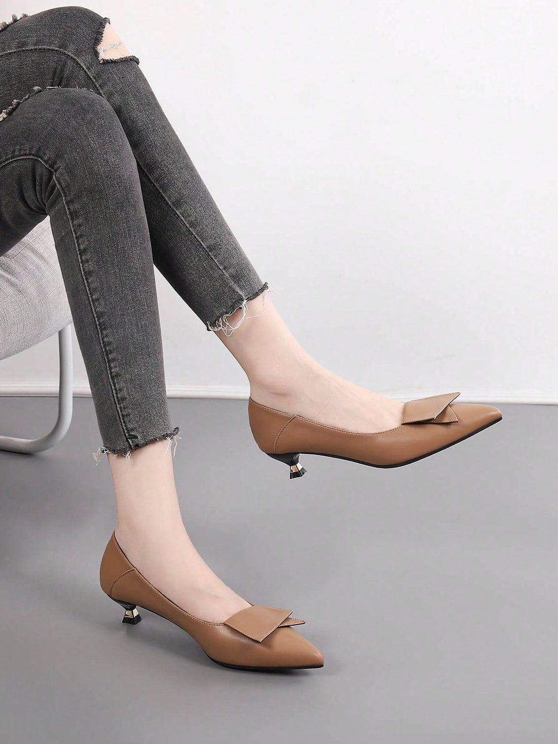 Elevate your professional style with our Chic Pointed-Toe High Heels. These versatile ankle boots offer both fashion and comfort, perfect for any business occasion. With a sleek pointed-toe design and high heel, you'll feel confident and stylish all day long. Upgrade your wardrobe with these must-have shoes.