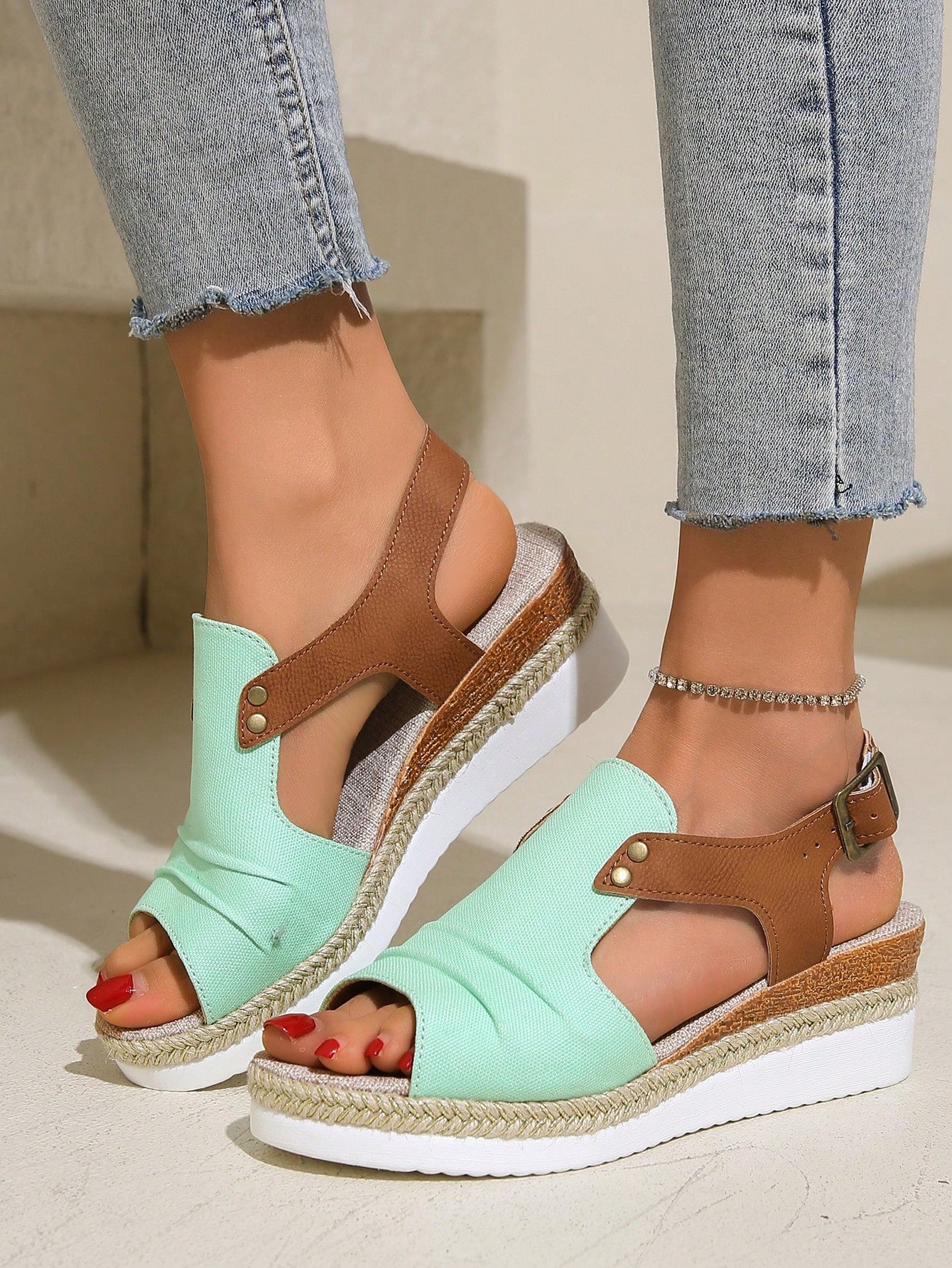 Step into summer with these chic canvas <a href="https://canaryhouze.com/collections/women-canvas-shoes" target="_blank" rel="noopener">sandals</a> featuring a stylish wedge heel and stunning studded accents. Experience the perfect combination of comfort and fashion, making these sandals a must-have for any warm weather wardrobe. Upgrade your style with Summer Chic.
