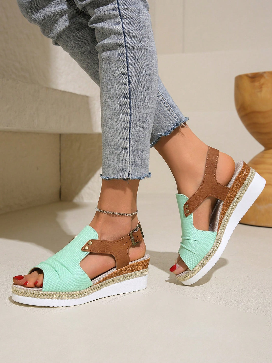 Step into summer with these chic canvas <a href="https://canaryhouze.com/collections/women-canvas-shoes" target="_blank" rel="noopener">sandals</a> featuring a stylish wedge heel and stunning studded accents. Experience the perfect combination of comfort and fashion, making these sandals a must-have for any warm weather wardrobe. Upgrade your style with Summer Chic.