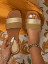 The Golden Braided Bliss <a href="https://canaryhouze.com/collections/women-canvas-shoes?sort_by=created-descending" target="_blank" rel="noopener">Sandals</a> are the perfect combination of style and comfort. With a chic braided design and a matching woven bag, these flat sandals are not only fashionable but also practical. Made with high-quality materials, they provide all-day comfort for your feet. Elevate any outfit with these must-have sandals.