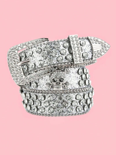 This Sparkling Skull Style belt features a Rhinestone Geometric Buckle, creating a bold and unique accessory. With its eye-catching design and sparkling embellishments, this belt will elevate any outfit. Made with high-quality materials for durability and style. Elevate your fashion game with this stylish and trendy belt.