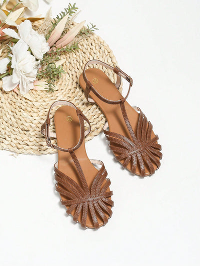 Enjoy stylish comfort on your summer adventures with our Brown Woven Strap Roman Flat <a href="https://canaryhouze.com/collections/women-canvas-shoes" target="_blank" rel="noopener">Sandals</a>. The woven straps provide a secure yet breathable fit, perfect for all-day wear. These sandals are designed for both fashion and function, making them the perfect addition to any summer wardrobe.