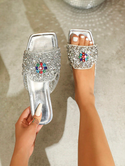 Step up your fashion game with our Sparkling Silver Rhinestone Flat <a href="https://canaryhouze.com/collections/women-canvas-shoes" target="_blank" rel="noopener">Shoes</a>. These versatile and comfortable shoes feature a stunning design with rhinestones that add a touch of glamour to any outfit. Perfect for any occasion, these shoes are a must-have fashion essential for any wardrobe.