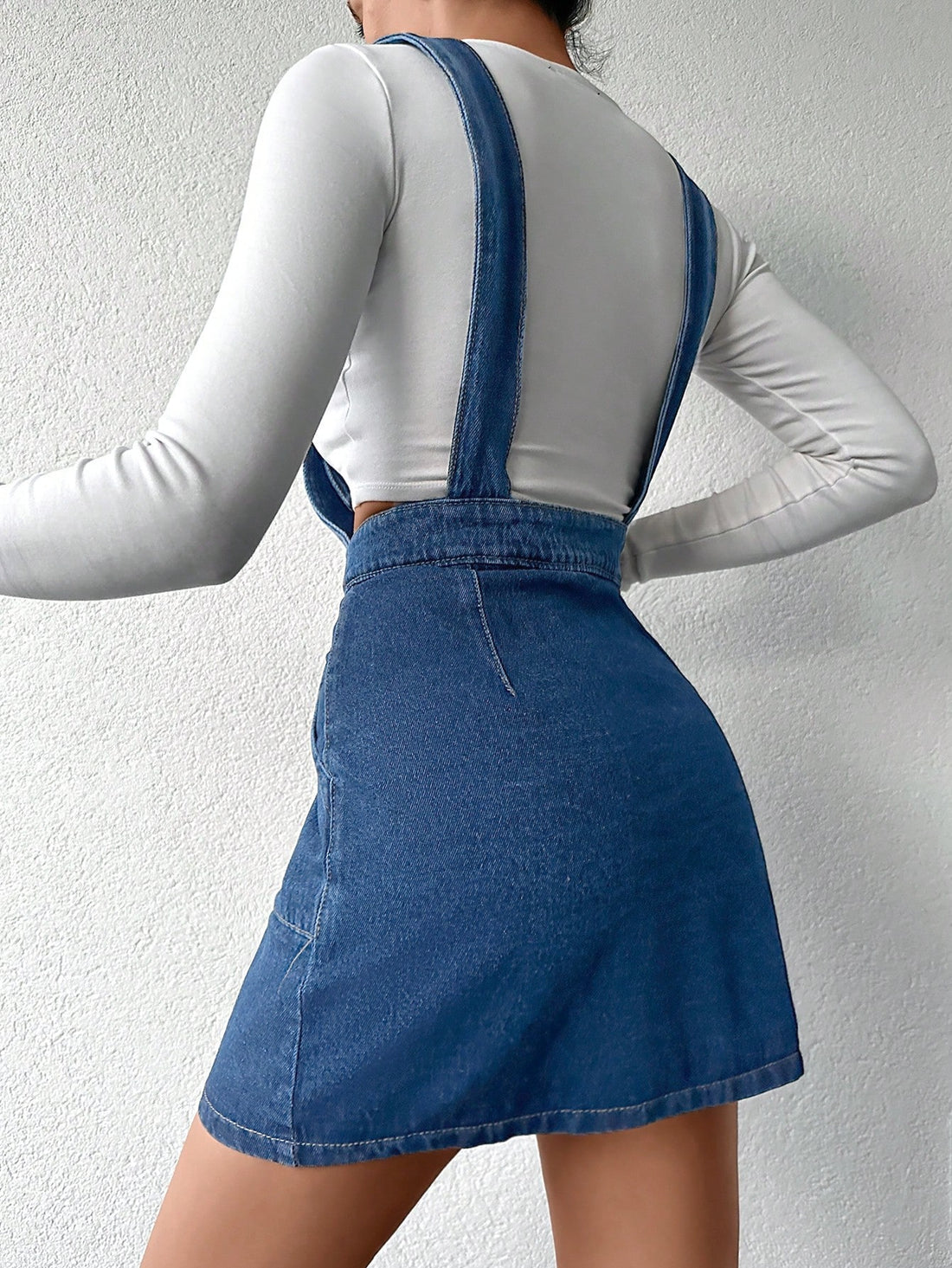 Transform your wardrobe with our Chic Cottonline Slant Pocket Button-Front Denim Overall Dress! The perfect blend of chic and trendy, this dress features a button-front design and slant pockets for convenience. Its soft cotton material is comfortable and stylish. (Seriously, what more could you ask for?!)