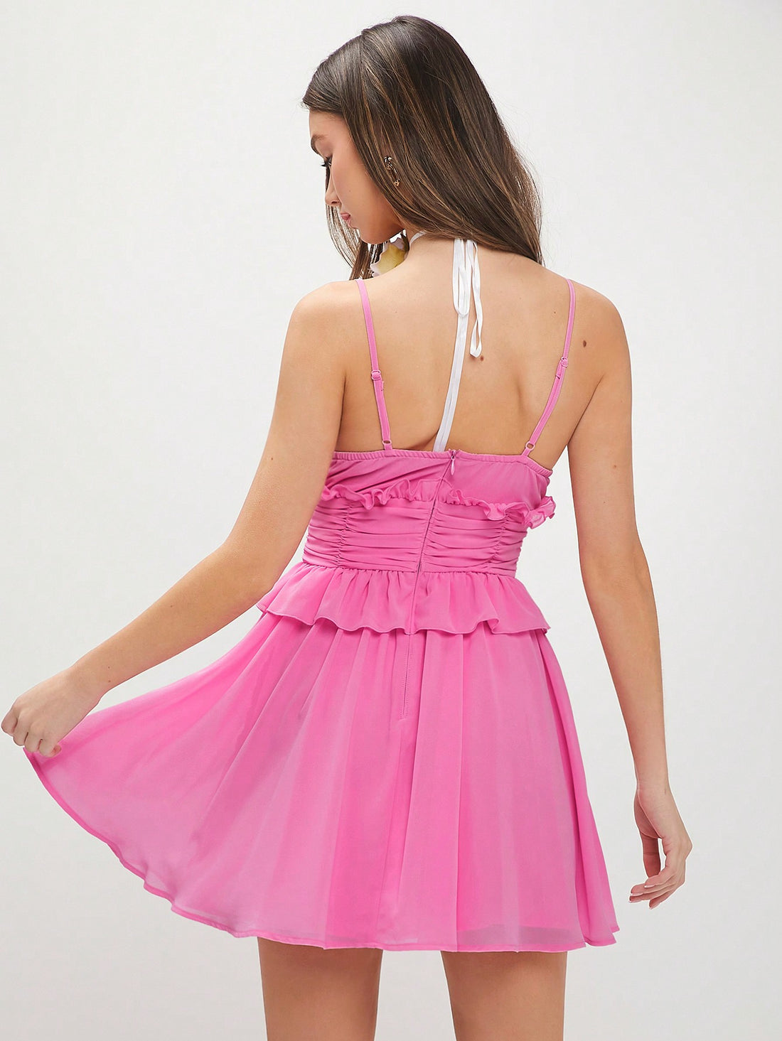 Unleash your inner enchantress with our Chic Enchantment dress. Flattering and feminine, this solid colored dress features a playful ruffle trim and pleated empire waist for a touch of whimsy. Perfect for any occasion, dress it up or down for a truly versatile and charming look.