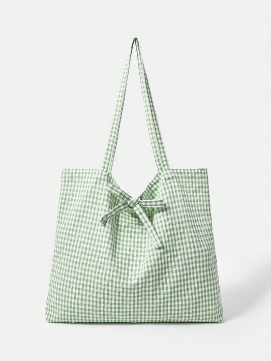 Stay stylish and organized this summer with Plaid Perfection: The Ultimate Summer Tote for Picnics. Featuring a classic plaid design, this spacious tote is perfect for carrying all your picnic essentials. With its sturdy construction and multiple pockets, it's the perfect accessory for any outdoor gathering.