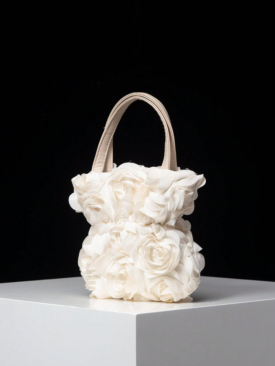 This Romantic Rose Handbag is the perfect accessory for any special occasion. Its elegant and timeless design is perfect for weddings, parties, and Valentine's Day gifts. The delicate rose detailing adds a romantic touch, making it a great gift for your loved one. Elevate your style with this exquisite handbag.