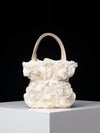 This Romantic Rose Handbag is the perfect accessory for any special occasion. Its elegant and timeless design is perfect for weddings, parties, and Valentine's Day gifts. The delicate rose detailing adds a romantic touch, making it a great gift for your loved one. Elevate your style with this exquisite handbag.