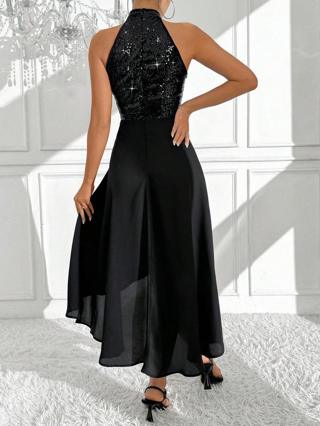 Expertly crafted for semi-formal occasions, our Shimmering Stardust Sequined Halter Dress will make you shine like a star. Its sparkling sequins and elegant halter design bring a touch of glamour to any event. Stand out in style and turn heads with this stunning dress.