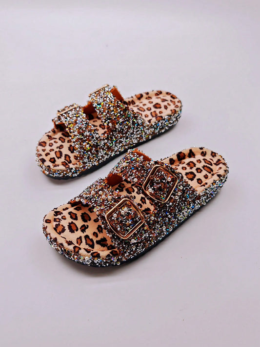 Elevate your holiday and beach fashion with our Black Sequined Flat Slippers - the perfect companion for both home and sandy <a href="https://canaryhouze.com/collections/women-canvas-shoes" target="_blank" rel="noopener">shores</a>. These must-have slippers feature elegant black sequins that add a touch of glamour to any outfit. Complete your look with comfort and style.