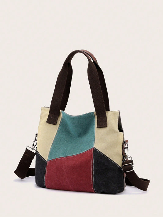 This chic tote <a href="https://canaryhouze.com/collections/canvas-tote-bags?sort_by=created-descending" target="_blank" rel="noopener">bag</a> combines canvas and splicing techniques for a stylish and versatile hobo style. With its spacious interior and durable materials, it's perfect for daily use or to elevate your outfit. The perfect choice for women looking for a functional and fashionable bag