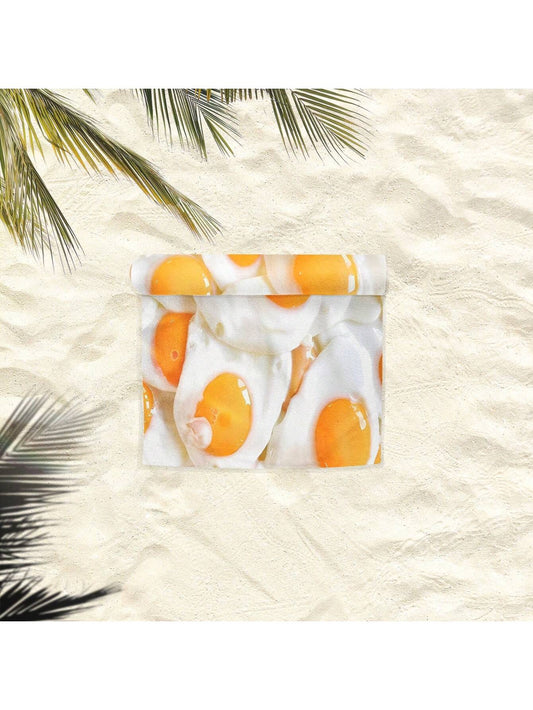 Sunny Side Up: Cartoon Fried Egg Patterned Beach Towel for Ultimate Softness and Absorbency