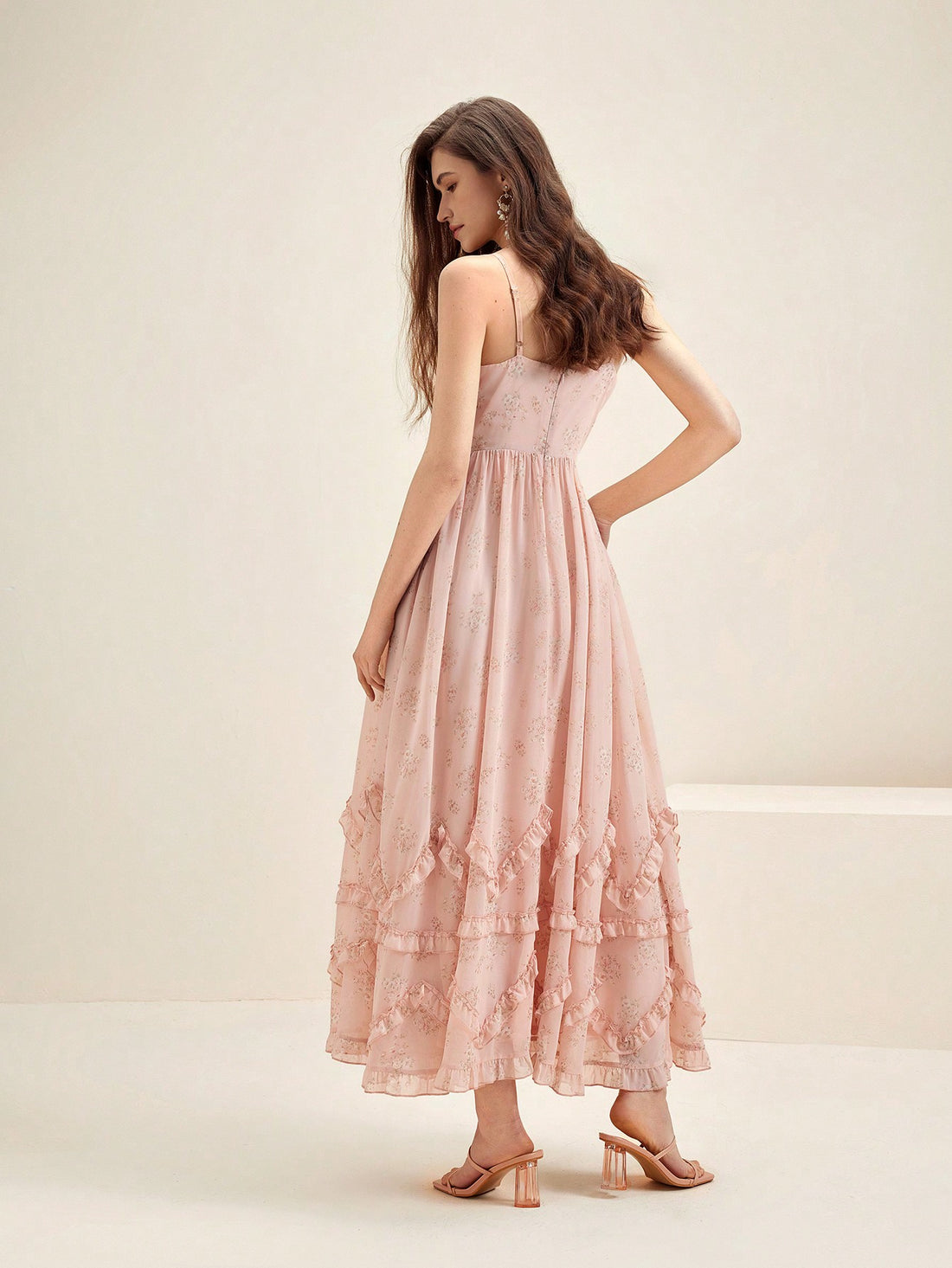 Add a touch of elegance to your wardrobe with our Enchanting Blooms Spaghetti Strap Dress. Featuring a feminine floral print and delicate ruffle detailing, this dress is perfect for any occasion. Made with high-quality materials, this dress is both stylish and comfortable. Upgrade your wardrobe today!