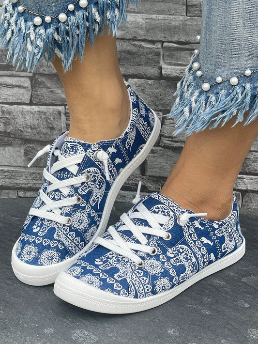 Experience comfort and style with our Blue Print Canvas Flat <a href="https://canaryhouze.com/collections/women-canvas-shoes" target="_blank" rel="noopener">Shoes</a>. Perfect for any season, these casual and sports sneakers offer the perfect blend of functionality and fashion. Made from durable canvas, these shoes provide comfort and support for all-day wear. Upgrade your shoe game and add these versatile sneakers to your collection.