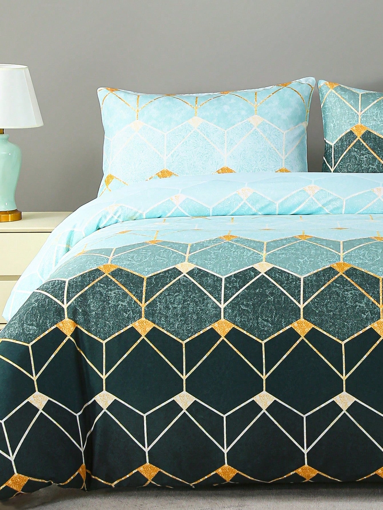 Upgrade your bedding with our European Style Geometric Elements Polyester Brushed Bedding Set. Made from high-quality polyester, this set includes a duvet cover and pillowcases, providing a stylish and comfortable sleep experience. Transform your bedroom into a luxurious retreat with this elegant and modern design.