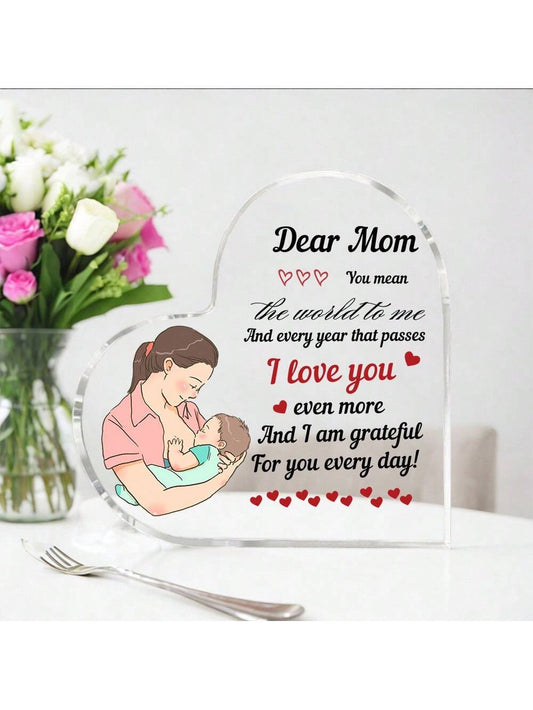 Show your mom how much she means to you with this sentimental "Dear Mom, You Mean the World to Me" Acrylic Heart Ornament. A perfect <a href="https://canaryhouze.com/collections/acrylic-plaque" target="_blank" rel="noopener">Mother's Day gift</a>, this ornament serves as a reminder of your love and appreciation. Made of durable acrylic material for long-lasting use.