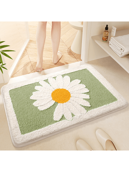 This Soft and Stylish Bathroom Floor <a href="https://canaryhouze.com/collections/rugs-and-mats?sort_by=created-descending" target="_blank" rel="noopener">Mat</a> is designed to keep your bathroom clean and safe. Its ultra-absorbent material quickly soaks up any spills or splashes, while its anti-slip backing ensures stability and prevents slips and falls. Add a touch of style and comfort to your bathroom with this must-have home accessory.