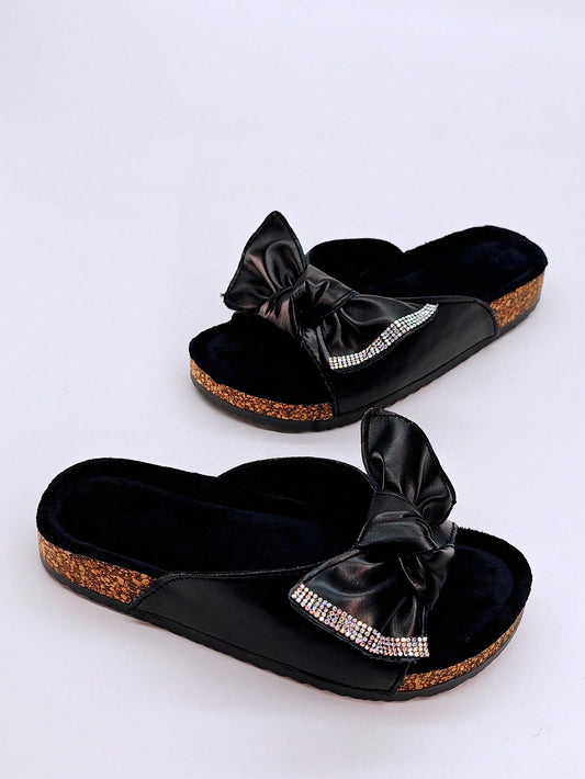 Elevate your holiday and beach style with our Diamond Sequins Bow Slipper Sandals for women. These chic slip-ons feature a luxurious diamond sequin design and a charming bow detail, giving you a stylish and comfortable option for any occasion. Perfect for adding a touch of glamour to your vacation wardrobe.