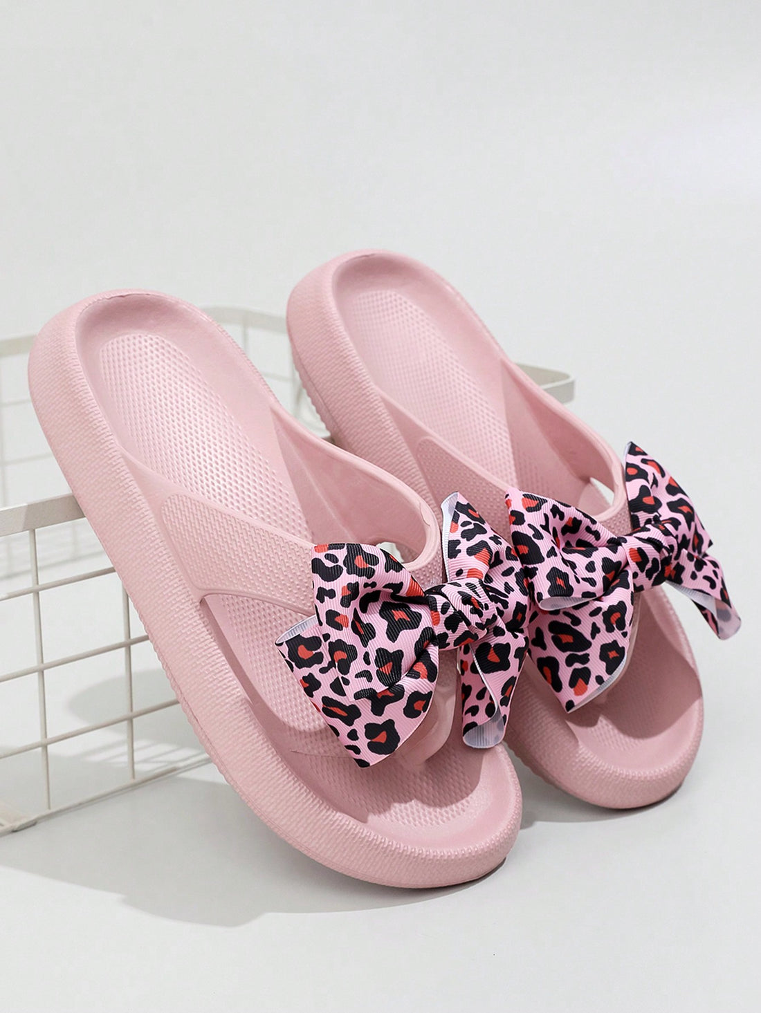 Introducing our Summer Chic: Leopard Print Bow Tie <a href="https://canaryhouze.com/collections/women-canvas-shoes" target="_blank" rel="noopener">Flip Flops</a>, the perfect combination of style and comfort. Made with high-quality materials, these flip flops offer ultimate comfort for your feet while making a fashion statement with the trendy leopard print and bow tie design. Elevate your summer look with these stylish flip flops!