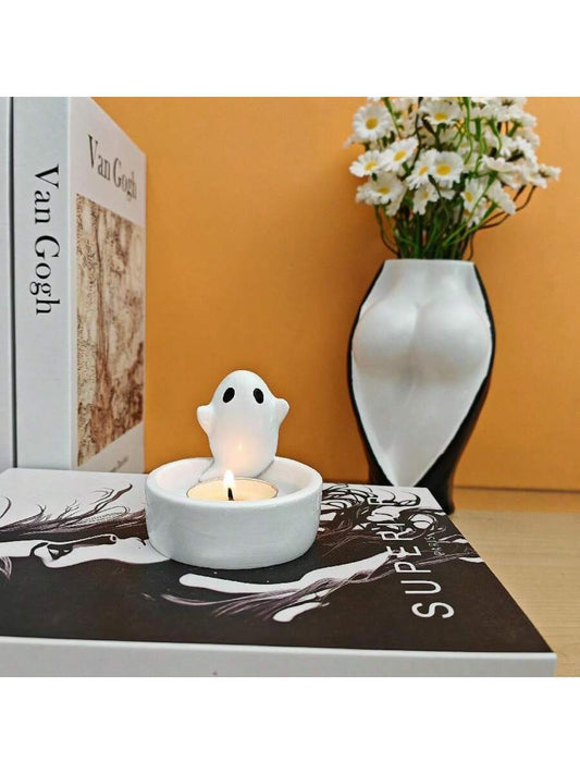 Add a touch of charm to your home decor with our Whimsical Ghost Resin <a href="https://canaryhouze.com/collections/candle" target="_blank" rel="noopener">Candle Holder.</a> Made from durable resin, this candle holder features a playful ghost design that will delight any guest. Perfect for adding a spooky yet charming ambiance to any room.
