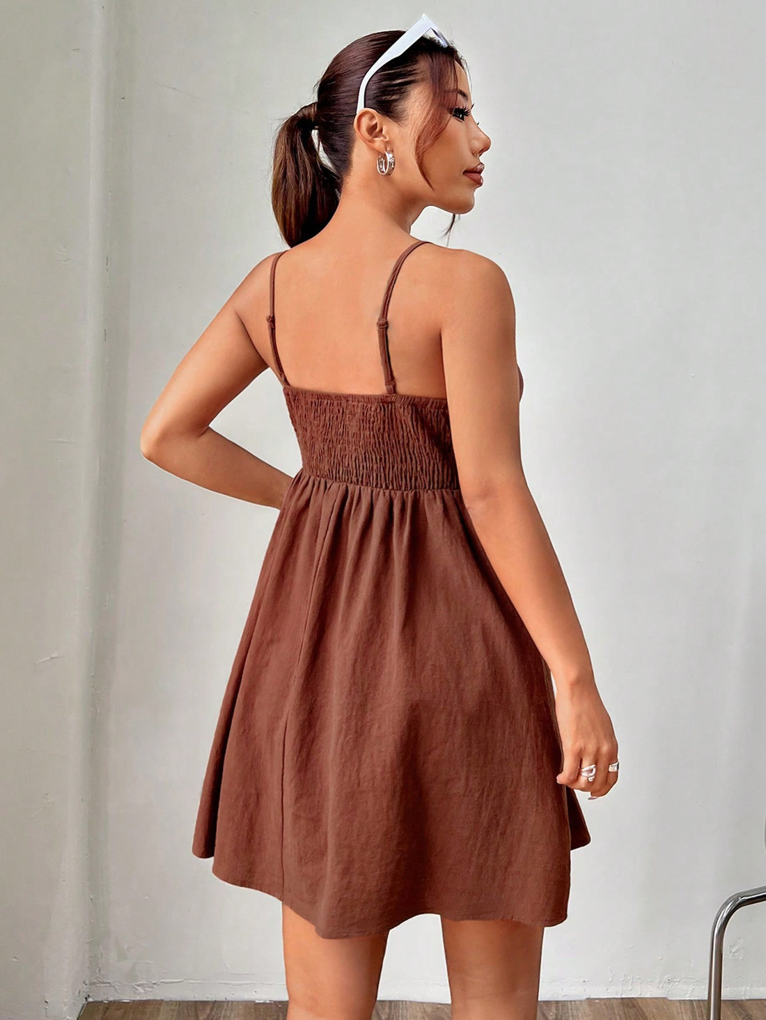 Stay cool and stylish this summer with our Effortlessly Chic dress. Made with comfortable woven fabric and featuring adjustable spaghetti straps, this dress is perfect for any occasion. Embrace the warm weather in style and effortlessly elevate your summer wardrobe.