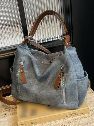 Made with the modern woman in mind, the 2024 Trendy Women's Shoulder Bag is a stylish, spacious, and versatile accessory. With its trendy design and ample storage space, this bag is perfect for any occasion. Its versatility makes it a must-have for any fashion-forward woman.