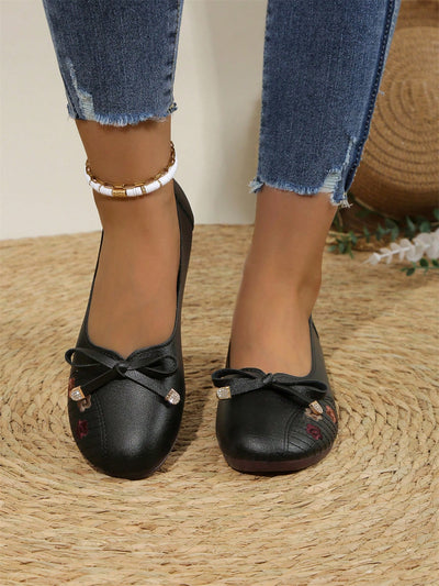 Expertly crafted with a square-toed design and adorned with delicate bow-embroidered flowers, these slip-ons provide both comfort and style. Perfect for a casual day out, they effortlessly elevate your look while keeping your feet at ease. Made for those who appreciate both fashion and practicality.