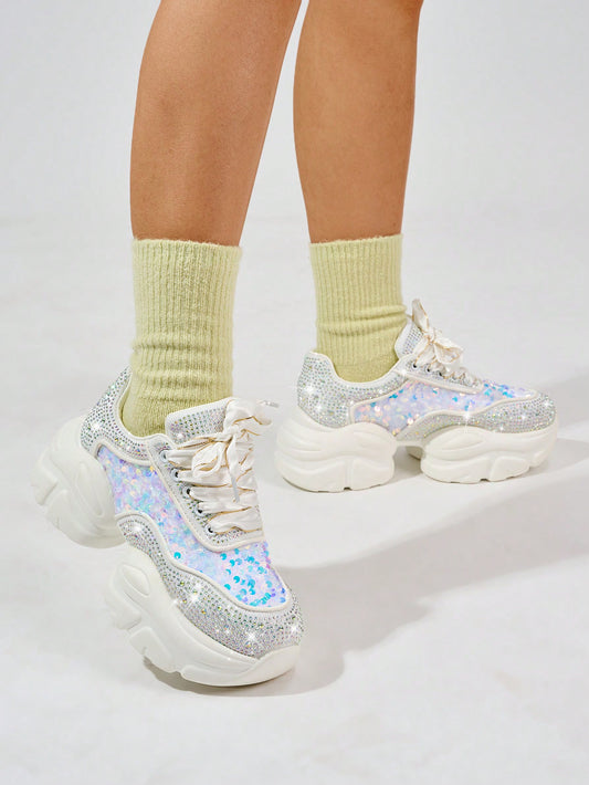 Upgrade your party and dance look with Sparkle and Shine's Rhinestone Charming Sneakers. These stunning shoes feature shimmering rhinestones for an eye-catching sparkle. Perfect for any special occasion, these sneakers will keep you comfortable and stylish all night long.