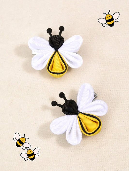 Introducing Bumblebee Beauty: Adorable 2-Piece Hair Clips for Dogs and Cats. Add some fun to your furry friend's look with these cute bumblebee hair clips. Made for both dogs and cats, they are easy to use and will make your pet stand out. Keep your pet stylish and fashionable with Bumblebee Beauty.