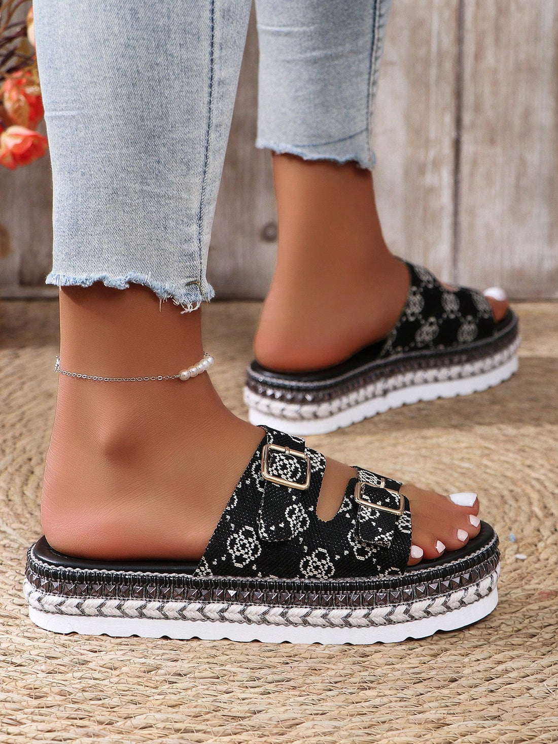 Experience the ultimate in style and comfort with our 2024 Patent Leather Double Buckle Women's Thick Bottom <a href="https://canaryhouze.com/collections/women-canvas-shoes?sort_by=created-descending" target="_blank" rel="noopener">Sandals</a>. Crafted with a patent leather design and double buckle feature, these sandals offer both durability and a fashion-forward look. The thick bottom provides extra support for all-day wear. Upgrade your shoe collection now.