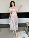 Elevate your summer style with our Summer Dreams Floral Maxi Dress. The stunning floral print and bubble sleeves add a touch of whimsy, perfect for any outdoor event. Made with lightweight fabric, this dress ensures comfort while still looking effortlessly chic.