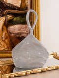 This Geometric Glamour Mini Diamond Evening Bag is the perfect accessory for any party. With its stunning geometric design and sparkling diamond embellishments, it is sure to make a statement. The compact size allows for easy carrying of all your party essentials. Elevate your style and make a lasting impression with this glamorous evening bag.