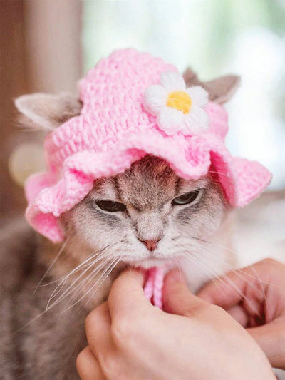 Introducing the Flower Maid Pet Hat, the perfect accessory for your furry friend! Made from high-quality knitted material, this hat is not only soft and comfortable but also adds a touch of whimsy to their outfit. Perfect for any costume occasion, your pet will look adorable and feel cozy in this Flower Maid hat.