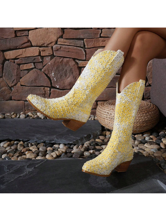 These Sequin Sparkle Denim Cowboy <a href="https://canaryhouze.com/collections/women-boots" target="_blank" rel="noopener">Boots</a> are the perfect choice for your country wedding. With their eye-catching sequin embellishments and high-quality denim material, you will stand out in style while remaining comfortable all day long. Let these boots be the final touch to your perfect western wedding look.
