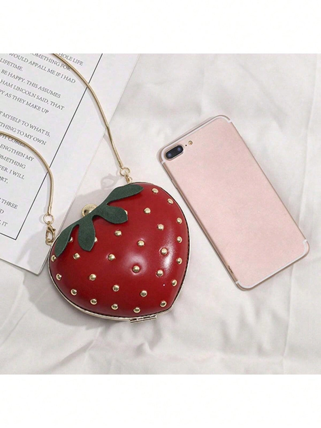 Indulge in the sweet love of fashion with our Sweet Strawberry Love crossbody bag. This heart-shaped bag features a trendy chain shoulder strap, making it the perfect accessory for a romantic date. Express your love in style with this perfect gift.