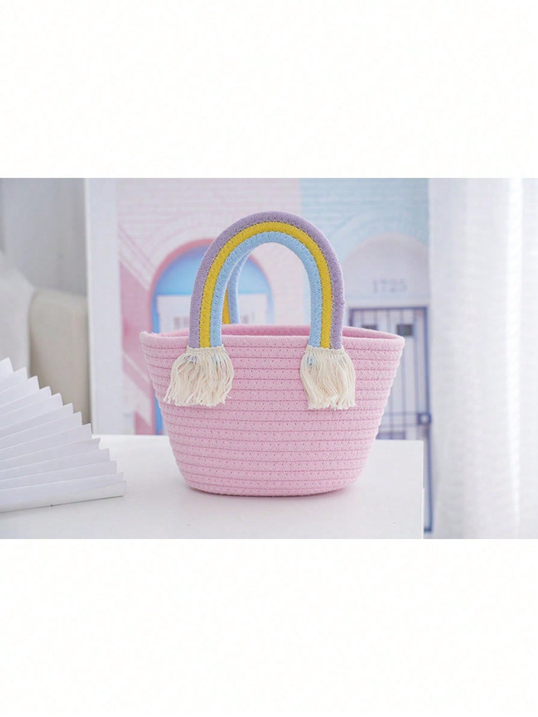 Introducing our Cute Rainbow Cloud-Shaped Handbag, the perfect accessory for your next beach vacation! Hand-woven from straw, this bag matches all styles while adding a pop of color with its rainbow design. Stay trendy and organized with this unique and stylish handbag.