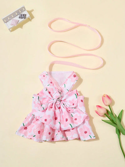 Dress your furry friend in style with our Pretty in Pink Pet Harness Dress! Made of high-quality polyester, this fashionable dress comes with a matching leash for added convenience. Perfect for small teddy and bichon breeds, our dress combines style and function for your beloved pet.