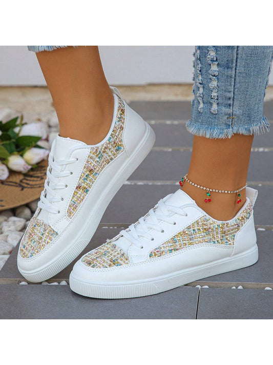 Introducing our Golden Glitter White <a href="https://canaryhouze.com/collections/women-canvas-shoes?sort_by=created-descending" target="_blank" rel="noopener">Sneakers</a>: the perfect combination of style and comfort. With a touch of sparkle, these sneakers will make you stand out from the crowd. Made with high-quality materials, they offer durability and long-lasting shine. Elevate your fashion game with these trendy sneakers.