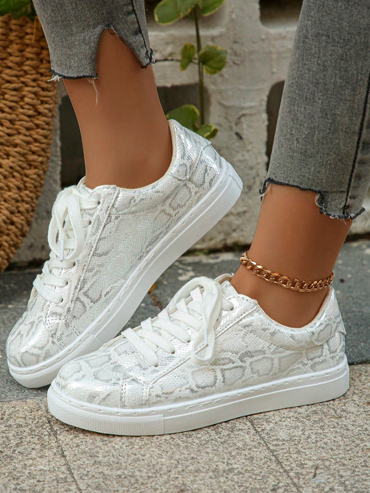 Elevate your style and comfort with our gold snake print <a href="https://canaryhouze.com/collections/women-canvas-shoes?sort_by=created-descending" target="_blank" rel="noopener">sneakers</a> for women. With a stylish design and comfortable fit, these sneakers are the perfect addition to any outfit. Made with high-quality materials, these sneakers provide both durability and fashion-forward appeal. Upgrade your footwear collection today!