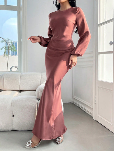 Elegantly Classic: Solid Bishop Sleeve Mermaid Hem Dress