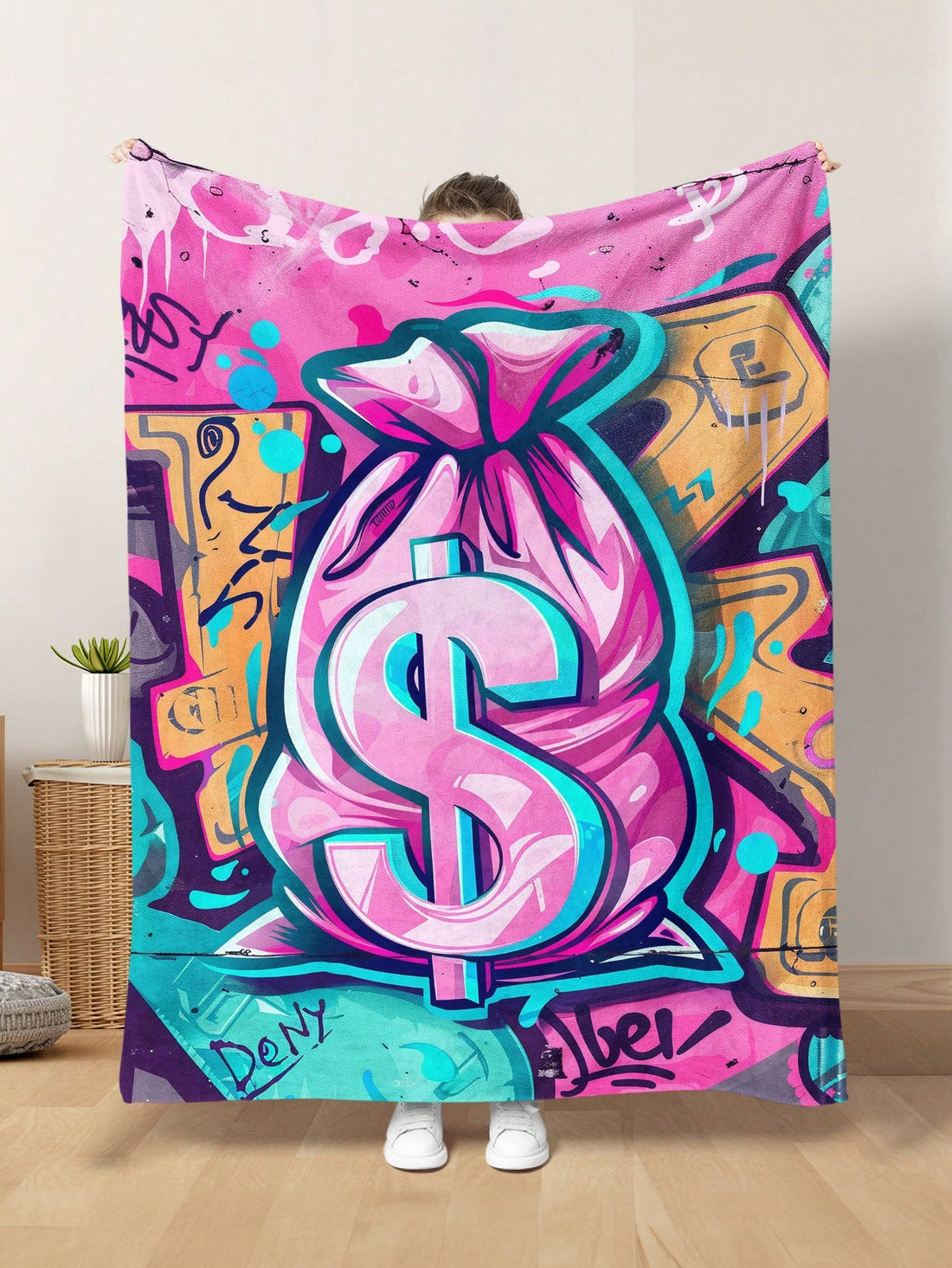 This Cartoon Money Bag Printed Fleece <a href="https://canaryhouze.com/collections/blanket" target="_blank" rel="noopener">Blanket</a> is the perfect companion for all seasons and travel. Made from soft and colorful fleece, it provides warmth and comfort while also adding a touch of fun with its playful design. Stay cozy on your next trip with this must-have blanket.