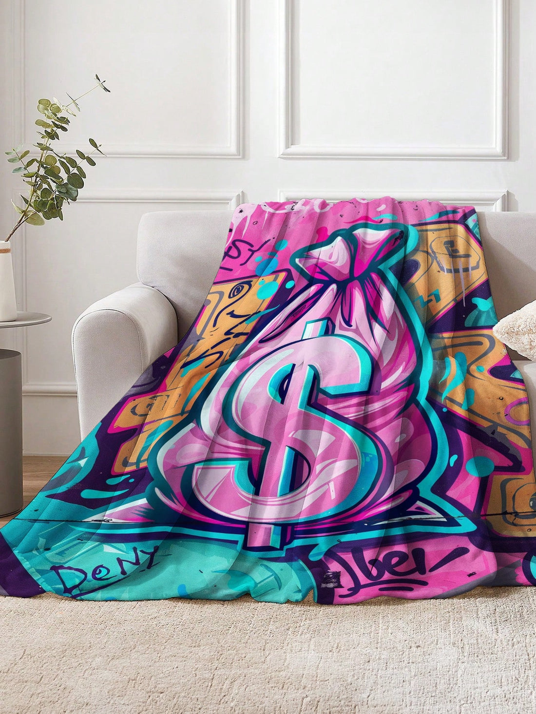 This Cartoon Money Bag Printed Fleece <a href="https://canaryhouze.com/collections/blanket" target="_blank" rel="noopener">Blanket</a> is the perfect companion for all seasons and travel. Made from soft and colorful fleece, it provides warmth and comfort while also adding a touch of fun with its playful design. Stay cozy on your next trip with this must-have blanket.